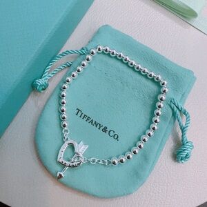 Tiffany & Co. Silver Beaded Heart Toggle Bracelet with Key Charm - Blue Green